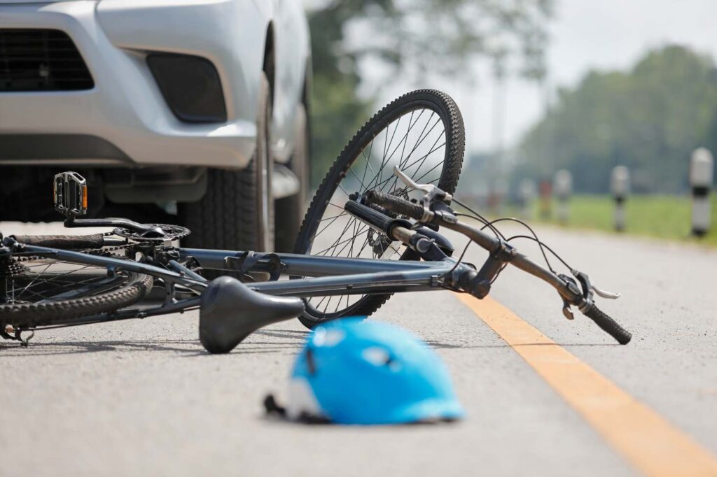 Bicycle crash scene with car in Apollo Beach, FL
