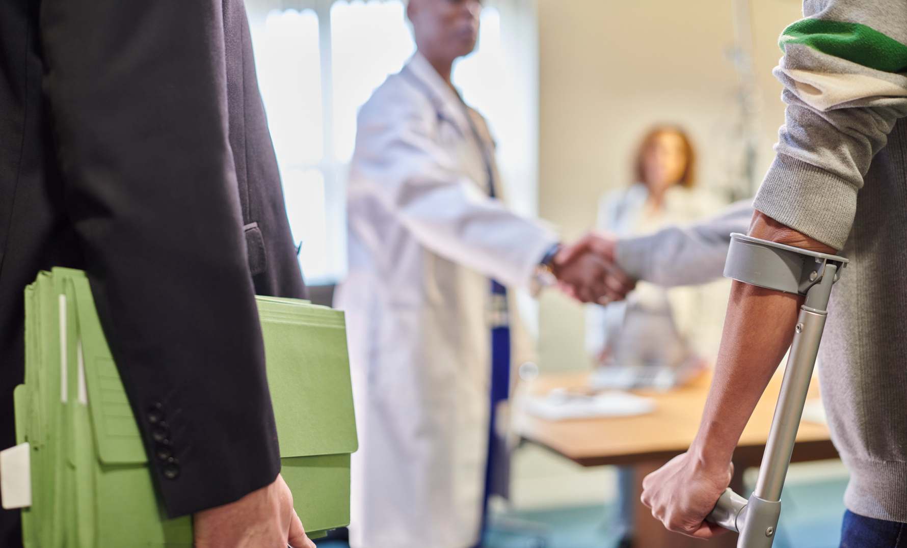 A lawyer discussing a medical negligence case at Sammons Injury Law.