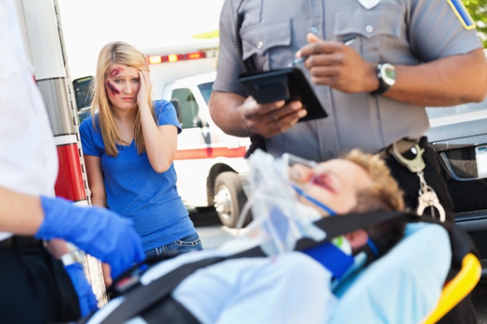 Paramedics & police checked the injured person on a stretcher in Apollo Beach, FL
